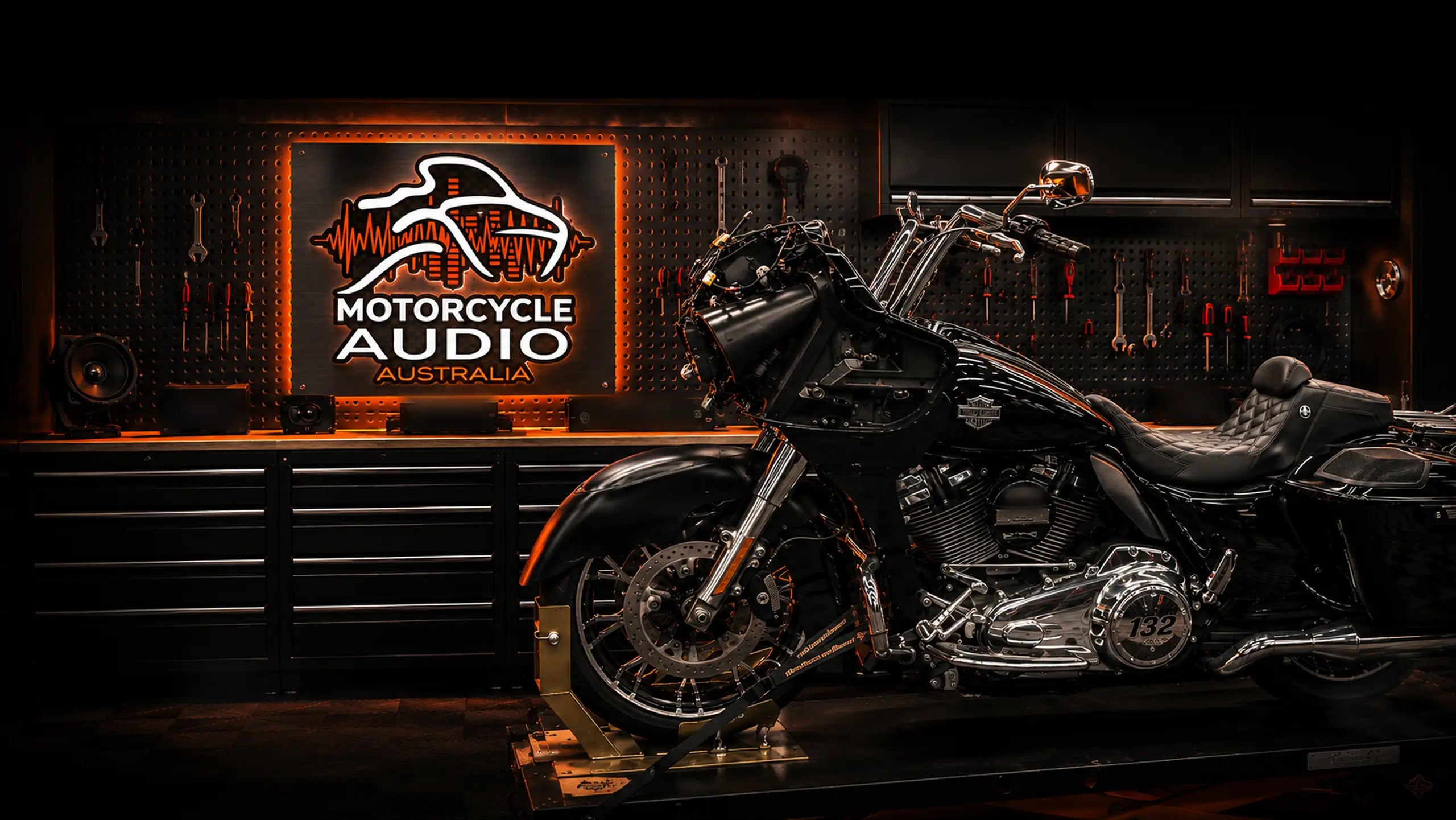 Harley-Davidson touring bike on the bench in the Motorcycle Audio Australia workshop